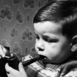 B4M7RM Smoking at an early age for 2 year old Hugh Condron Would you let your two year old son smoke and drink Chubby Hugh Condron of M